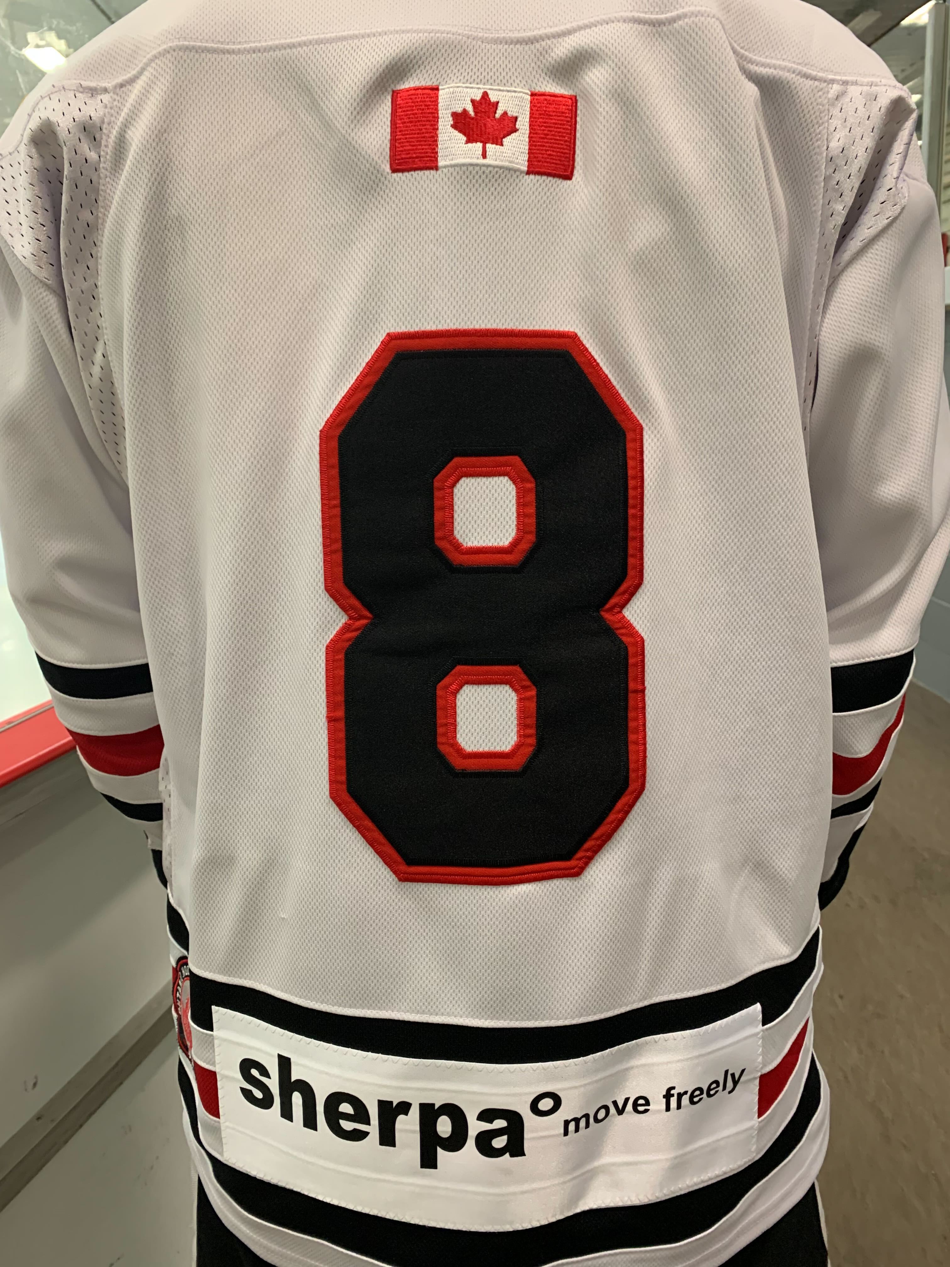 Schomberg Cougars jersey with sherpa° logo